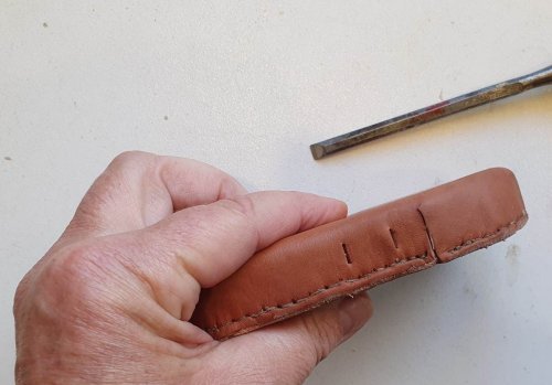 Leather case and small chisel