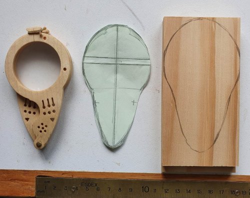 Medieval glasses, paper pattern and wooden block