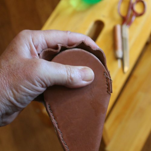 Sewing up a leather case