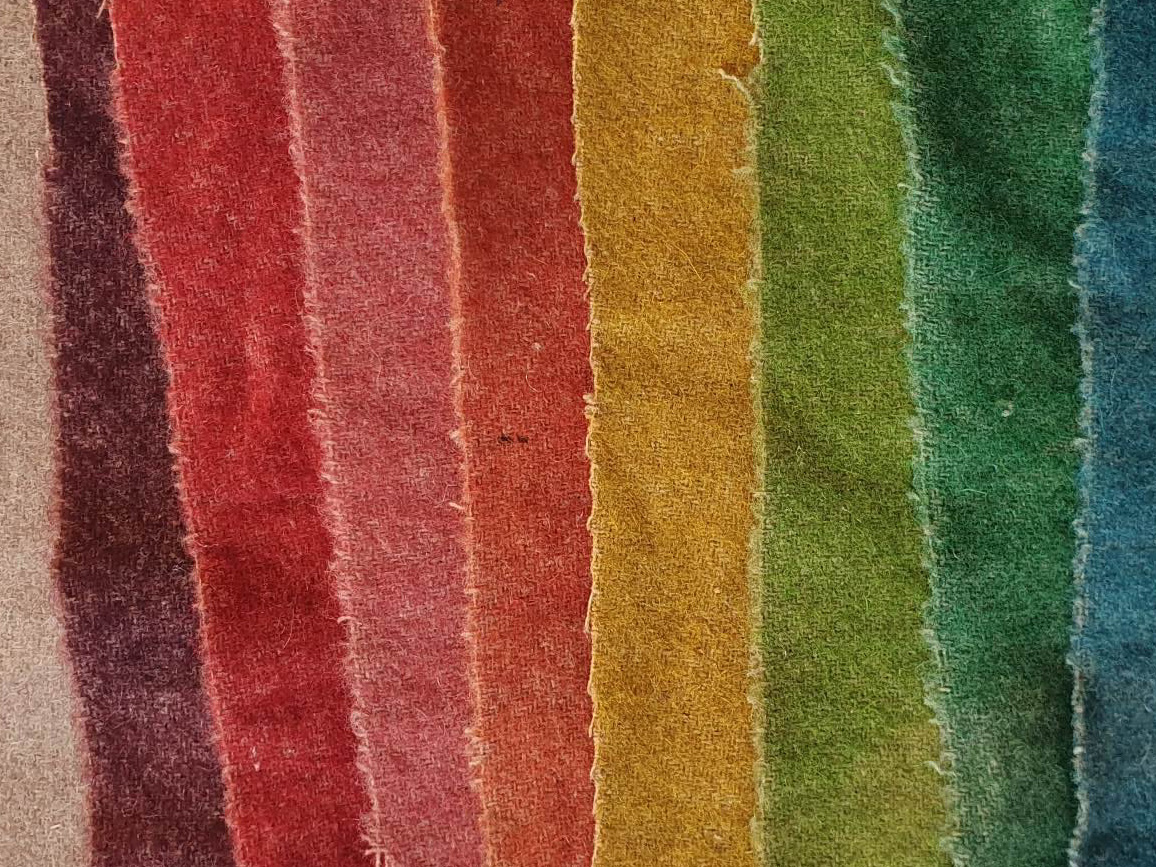Strips of wool fabric dyed in a range of colours