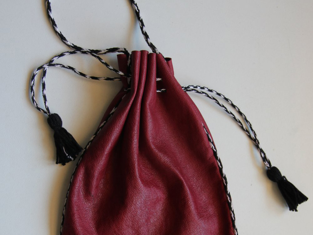 Red leather purse with drawstrings