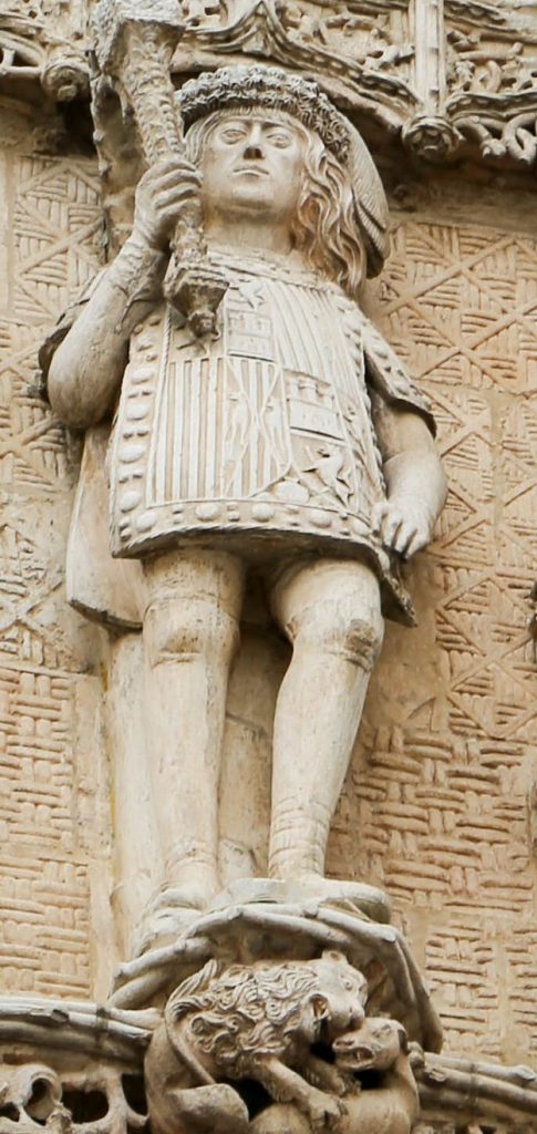 Medieval statue of herald in tabard