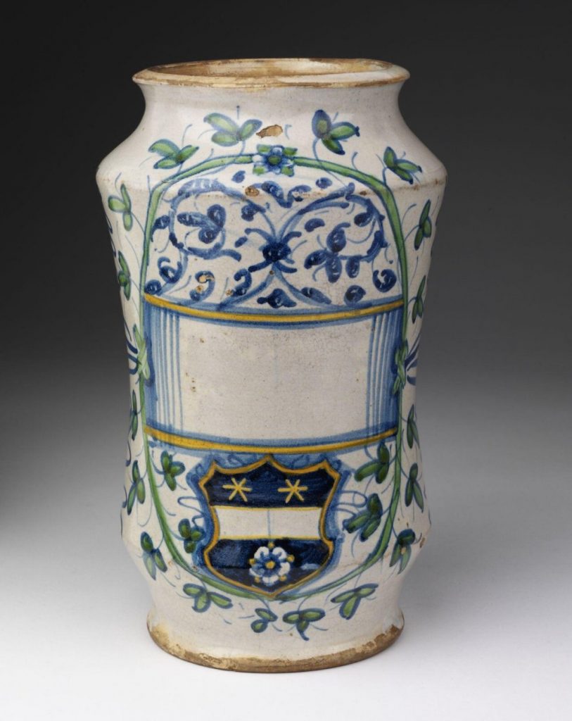 Renaissance ceramic jar with empty lable and flower decorations