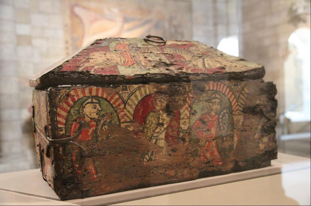Old rectangular box with peaked lid, painted with medieval figures