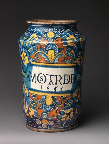 Ceramic jar with the word 'Mostarda' and foliage decoration