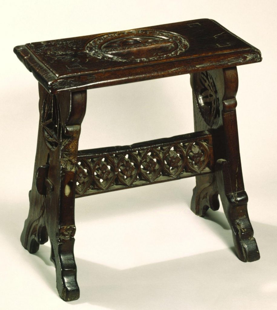 15th century rectangular stool with slot in seat